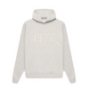 Fear of God Essentials 1977 hoodie in light oatmeal front view
