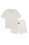 Fear of God Essentials 1977 Light Oatmeal Summer Set t-shirt and shorts set in light oatmeal front view