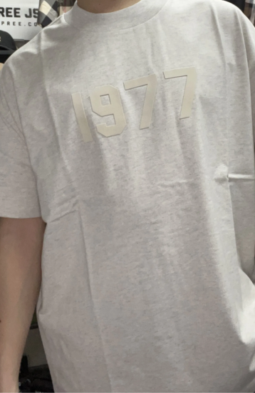 Fear of God Essentials 1977 Light Oatmeal Summer Set t-shirt in light oatmeal front view