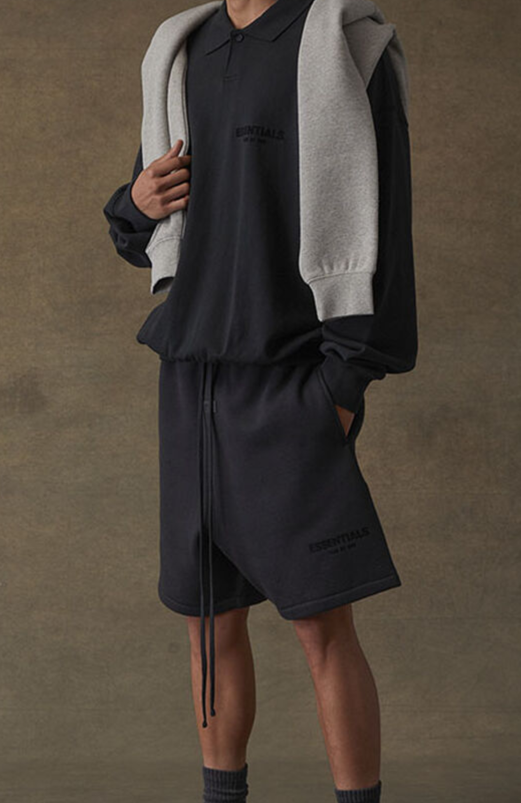 Fear of God Essentials Black Limo Summer t-shirt and shorts in black worn by model