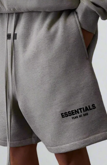 Fear of God Essentials Dark Oatmeal Summer Set shorts in dark oatmeal worn by model detail view