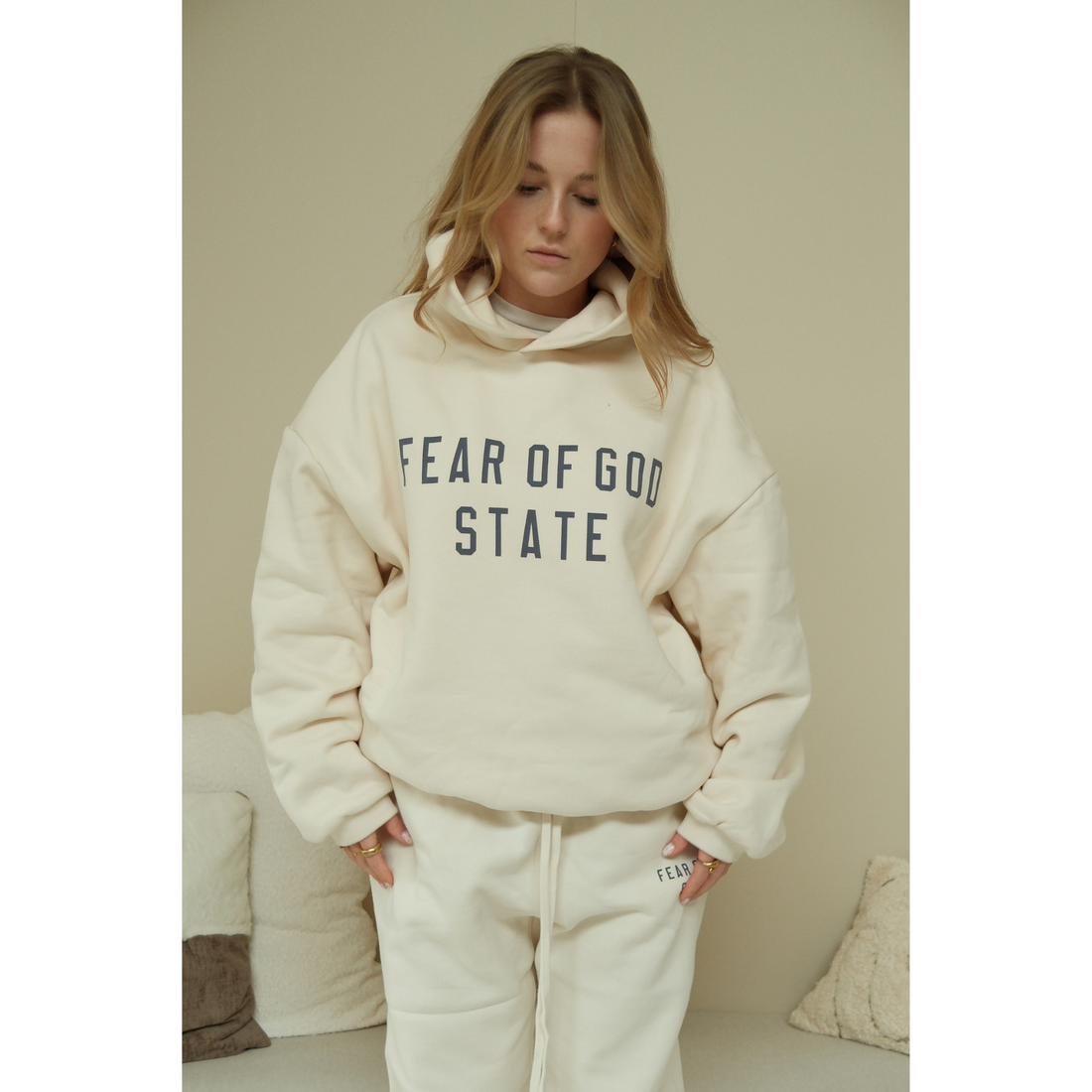 Fear of God Essentials hoodie in shell front view