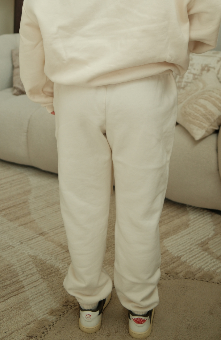 Fear of God ESSENTIALS sweatpants in fleece shell worn by model alternate view