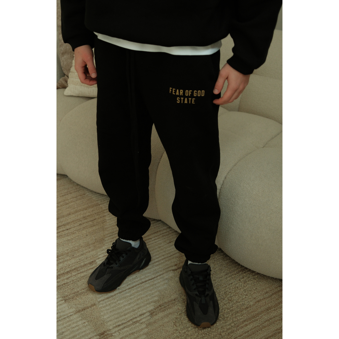 Fear of God Essentials FW24 sweatpants in black front view