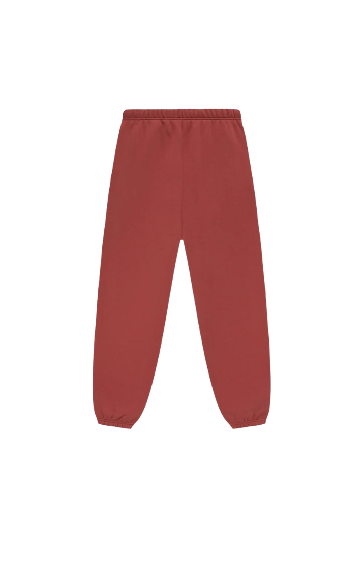 Fear Of God Essentials sweatpants in crimson front view