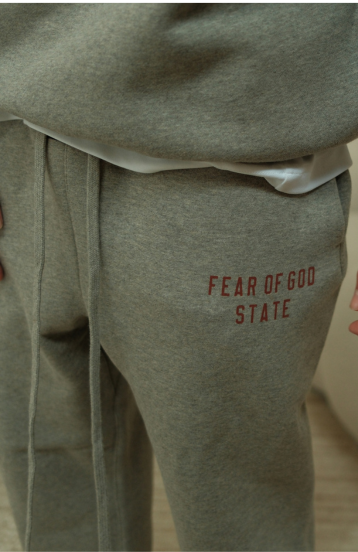 Fear of God Essentials FW24 Dark Heather State Full Set sweatpants in dark heather front view