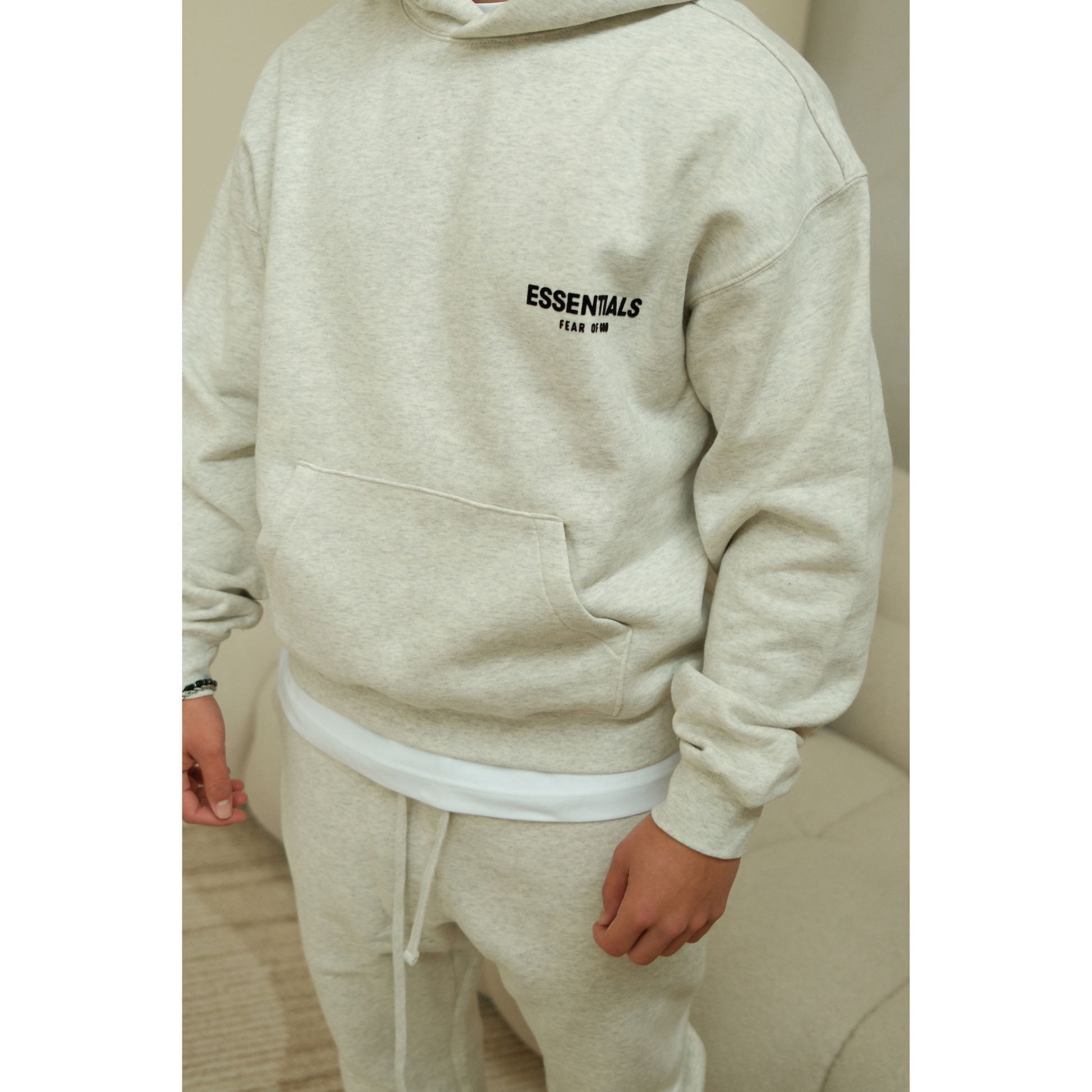 Fear of God Essentials hoodie and sweatpants set in light oatmeal detail view