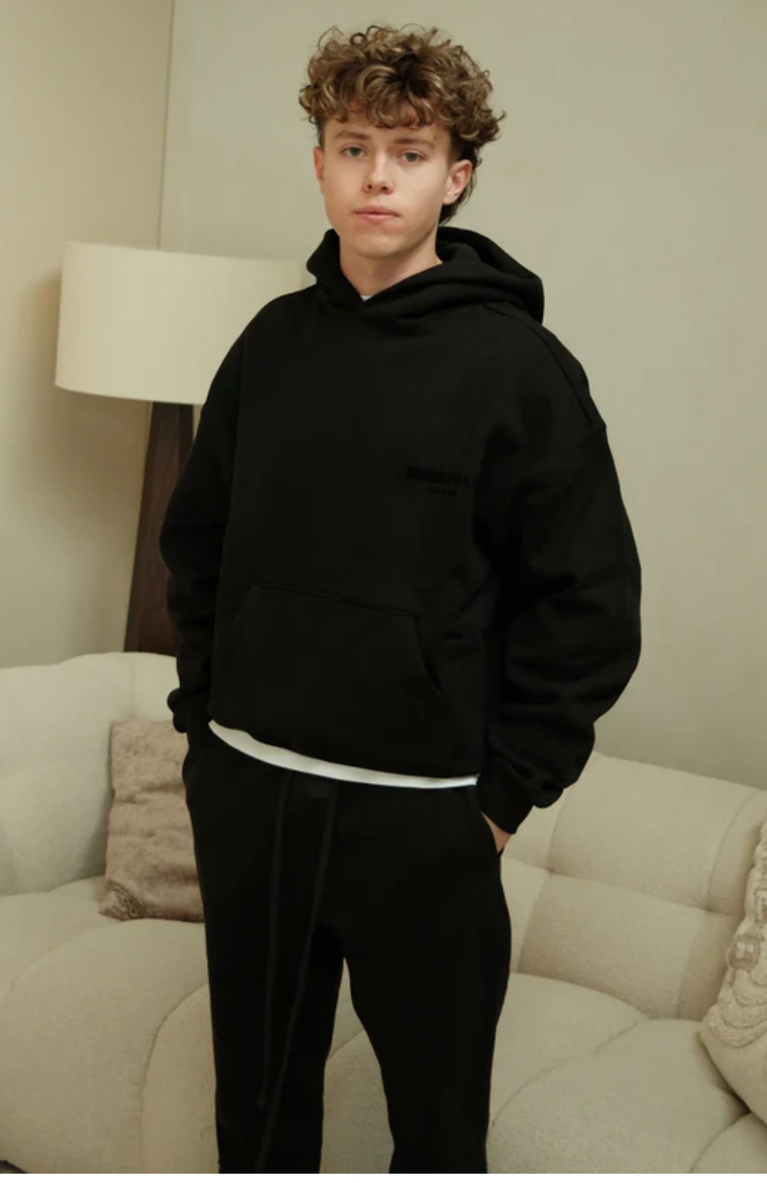Fear of God Essentials Limo Black Full Set hoodie and sweatpants set in limo black worn by model