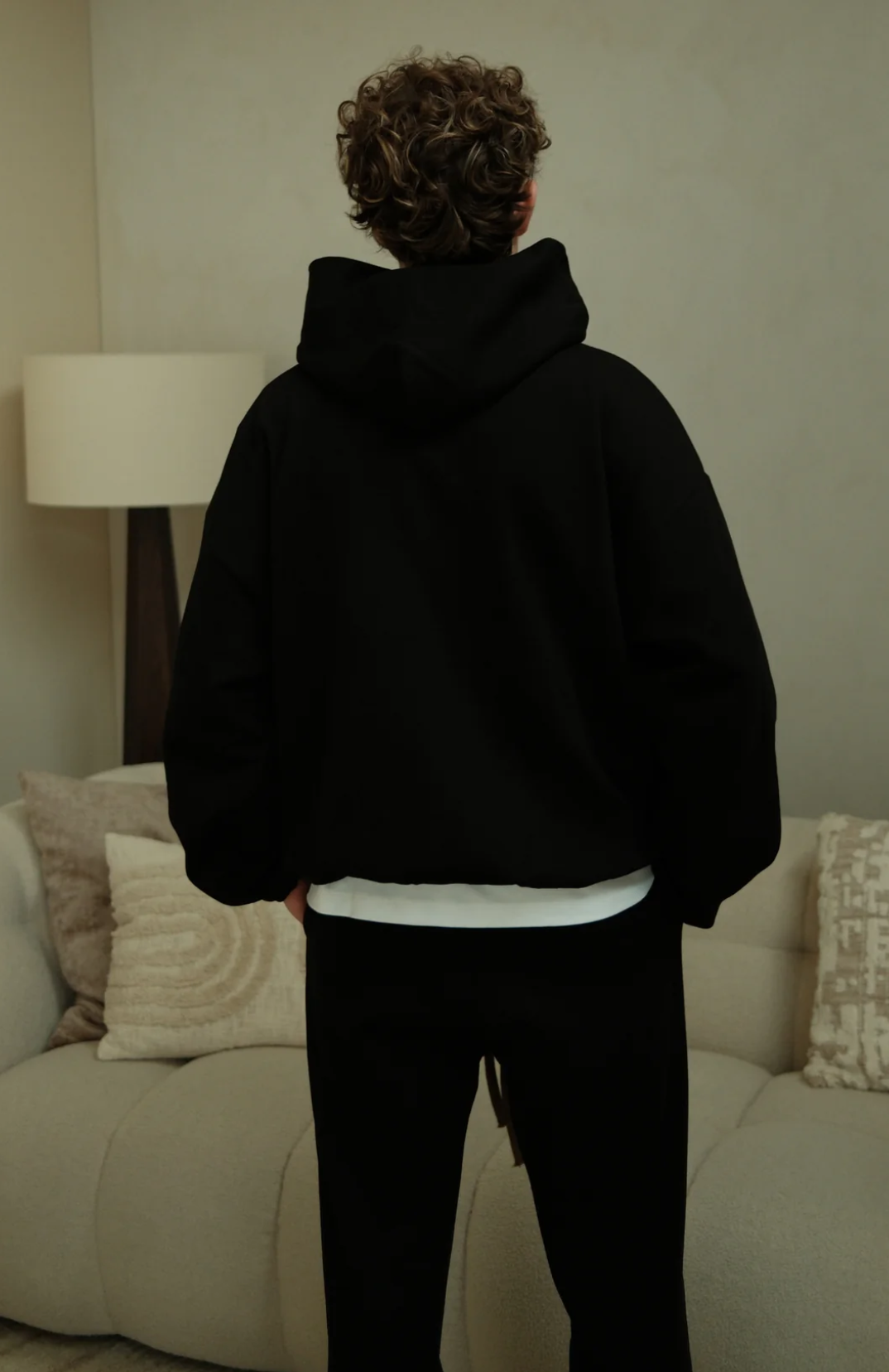Fear Of God Essentials NBA sweatpants in black front view
