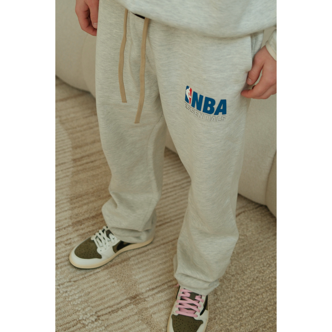 Fear of God Essentials NBA Light Heather sweatpants in light heather front view