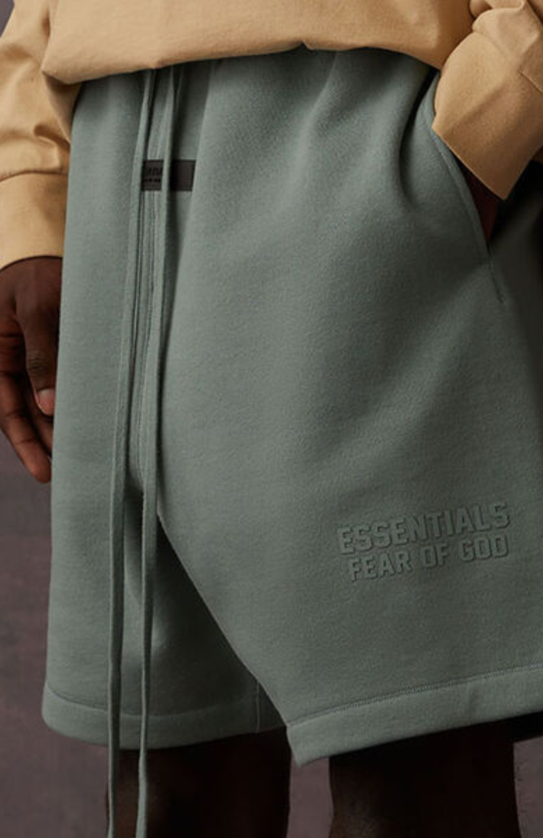 Fear of God Essentials Sycamore Summer shorts in green front view