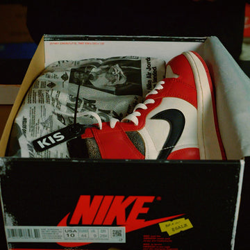 Sneakers inside Nike shoebox ready for shipping