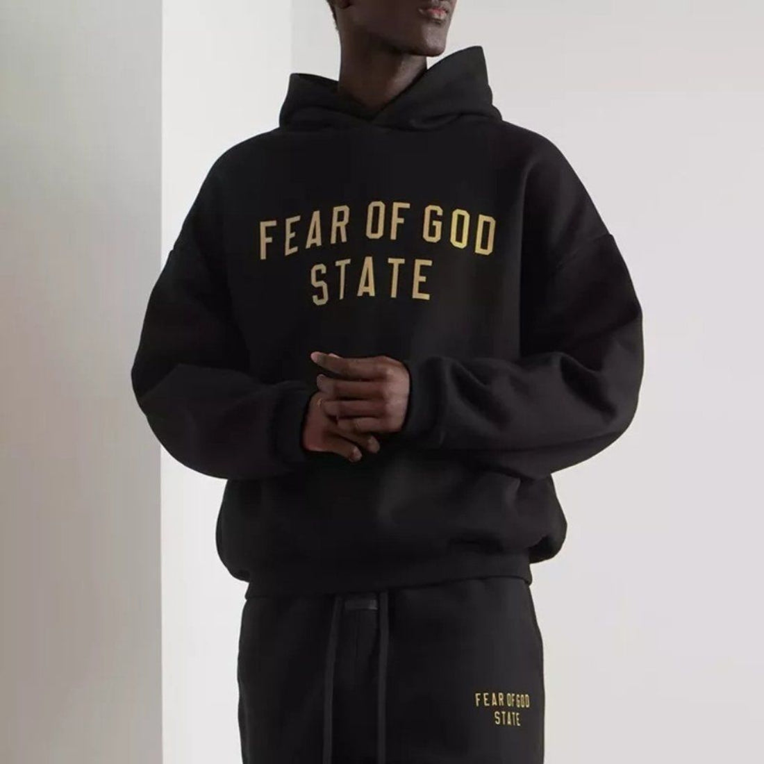 Fear of God Essentials FW24 Black Yellow State Hoodie